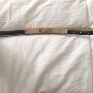 Black leather and gold metal belt. Bcbgeneration S